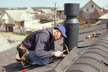 a-professional-master-roofer-with-hammer-repairs-.webp a-professional-master-roofer-with-hammer-repairs-.webp